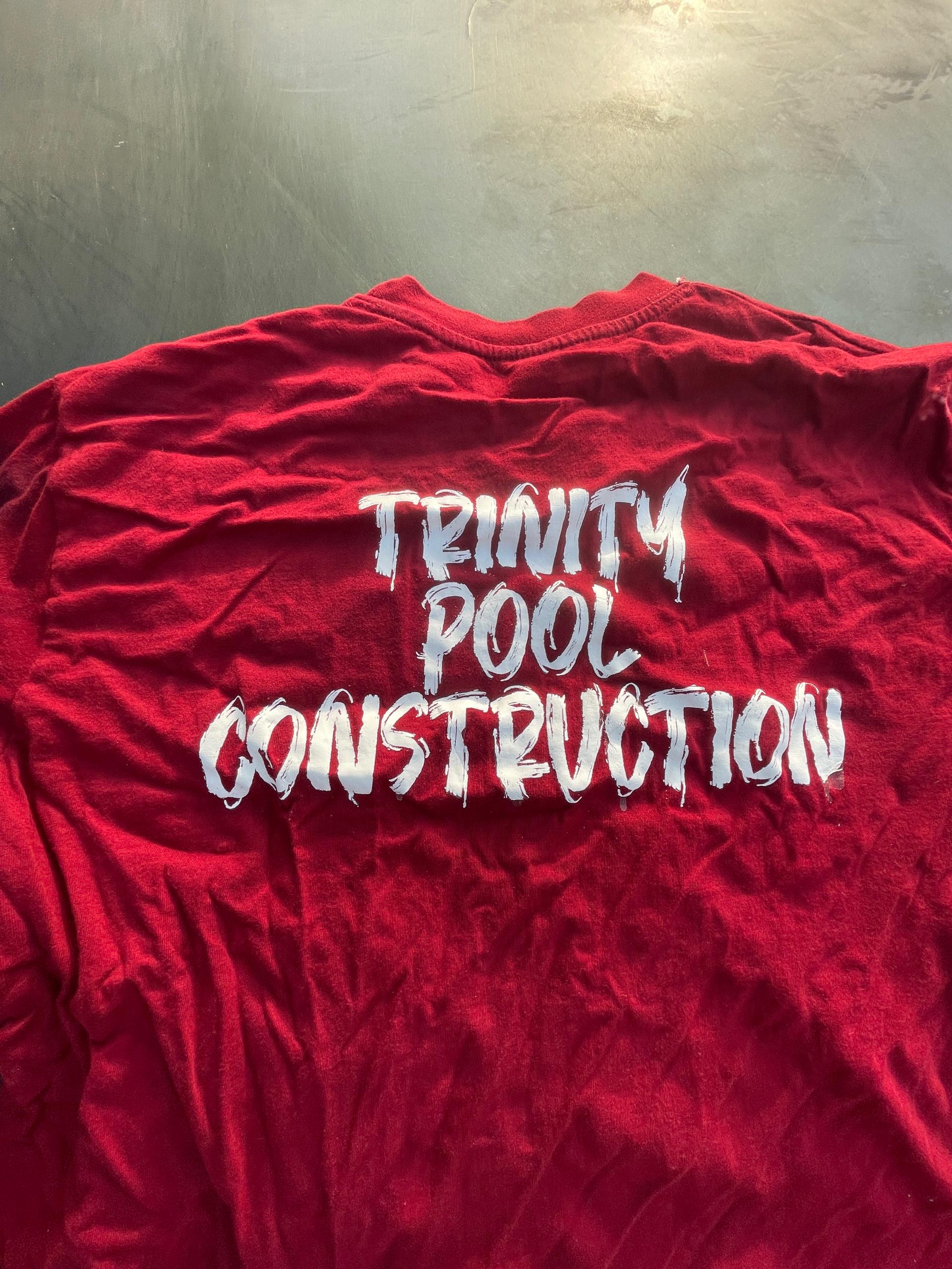 Trinity Pool Construction branded team shirt