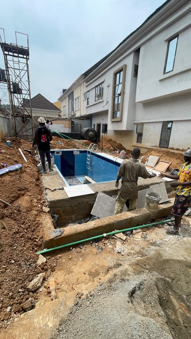 Swimming Pool Construction — Tiling In Progress